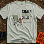 Chair Called Dibs - T-Shirt in Bay - A green folding camp chair with a mug in its cup holder and a towel draped over the...