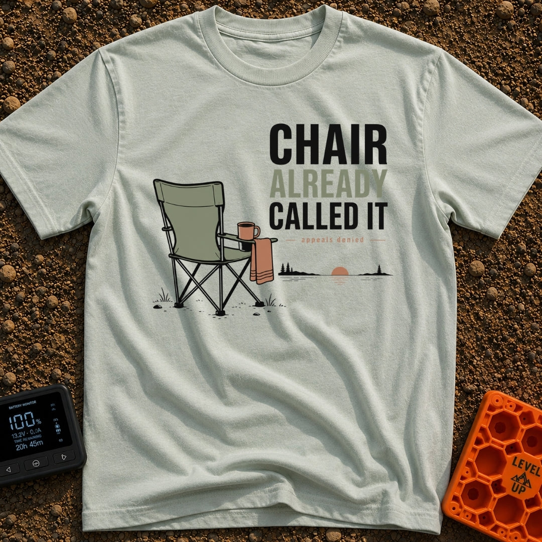 Chair Called Dibs - T-Shirt in Bay - A green folding camp chair with a mug in its cup holder and a towel draped over the...
