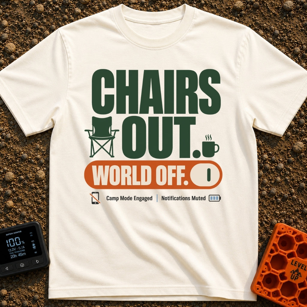 Camp Mode Engaged - T-Shirt in Ivory - The design features large green text reading "CHAIRS OUT." alongside small icons...