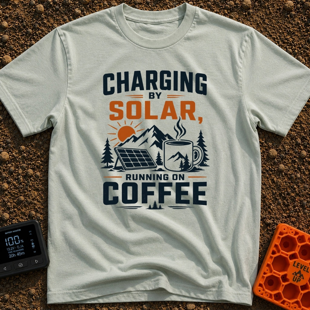 Solar Powered Coffee Fueled - T-Shirt in Bay - A graphic illustration featuring a portable solar panel and a large...