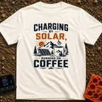 Solar Powered Coffee Fueled - T-Shirt in Ivory - A graphic illustration featuring a portable solar panel and a large...
