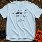 Charging Somewhere Better - T-Shirt in Chambray - Text reading "CHARGING SOMEWHERE BETTER" stacked above a minimalist...