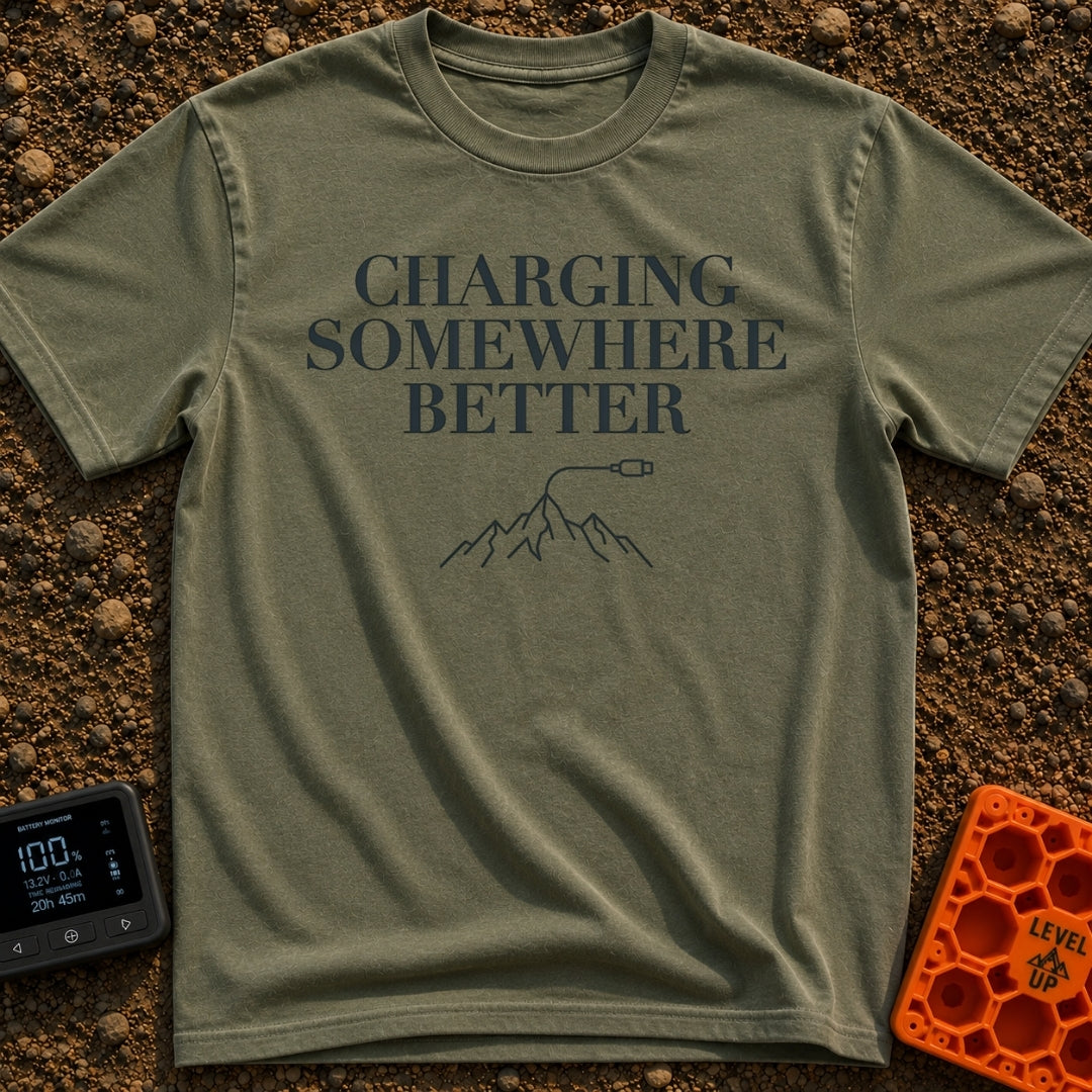 Charging Somewhere Better - T-Shirt in Moss - Text reading "CHARGING SOMEWHERE BETTER" stacked above a minimalist line...