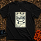 Powered by Wanderlust - T-Shirt in Black - A graphic designed to look like a vintage shipping tag with a string loop at...