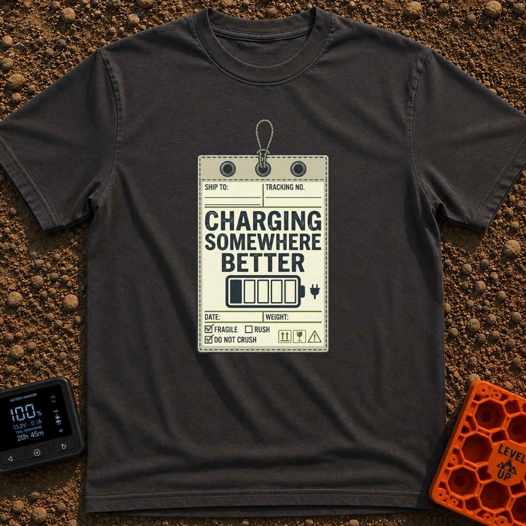 Powered by Wanderlust - T-Shirt in Graphite - A graphic designed to look like a vintage shipping tag with a string loop...