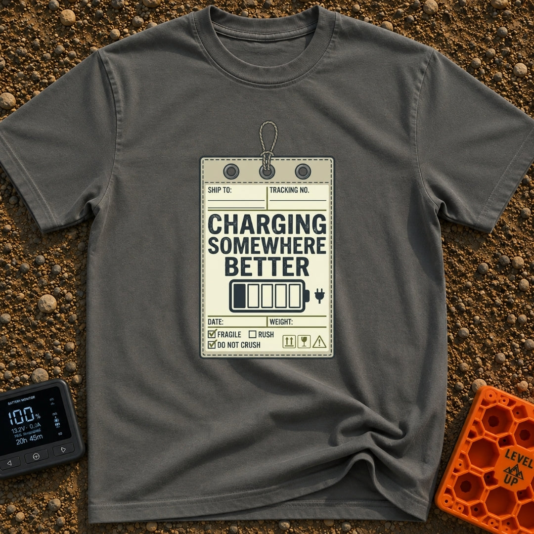 Powered by Wanderlust - T-Shirt in Pepper - A graphic designed to look like a vintage shipping tag with a string loop at...
