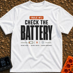Battery Before Coffee - T-Shirt in White - Typographic design featuring bold text reading "RULE #1: CHECK THE BATTERY"...