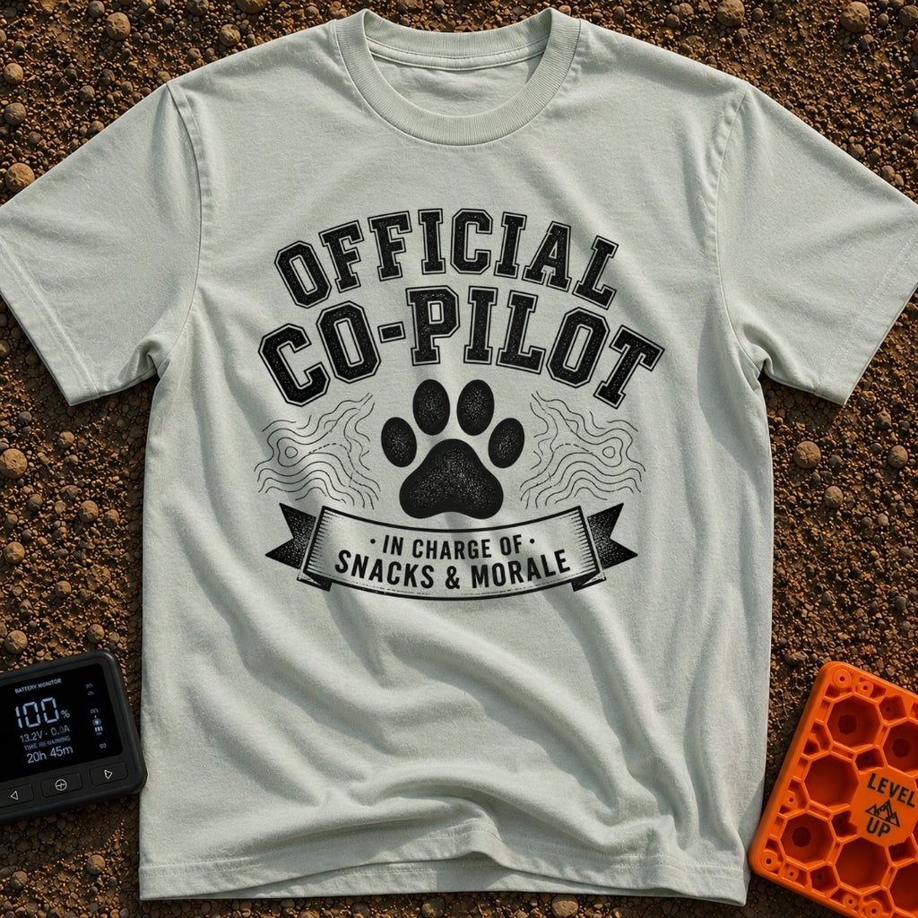 Director of Snacks - T-Shirt in Bay - A black and white graphic featuring a large animal paw print centered between...