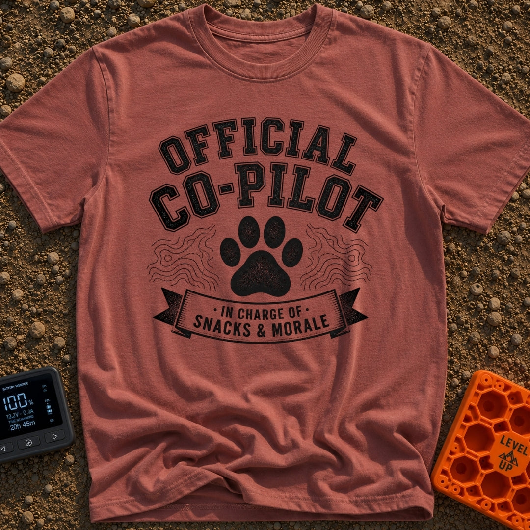 Director of Snacks - T-Shirt in Brick - A black and white graphic featuring a large animal paw print centered between...