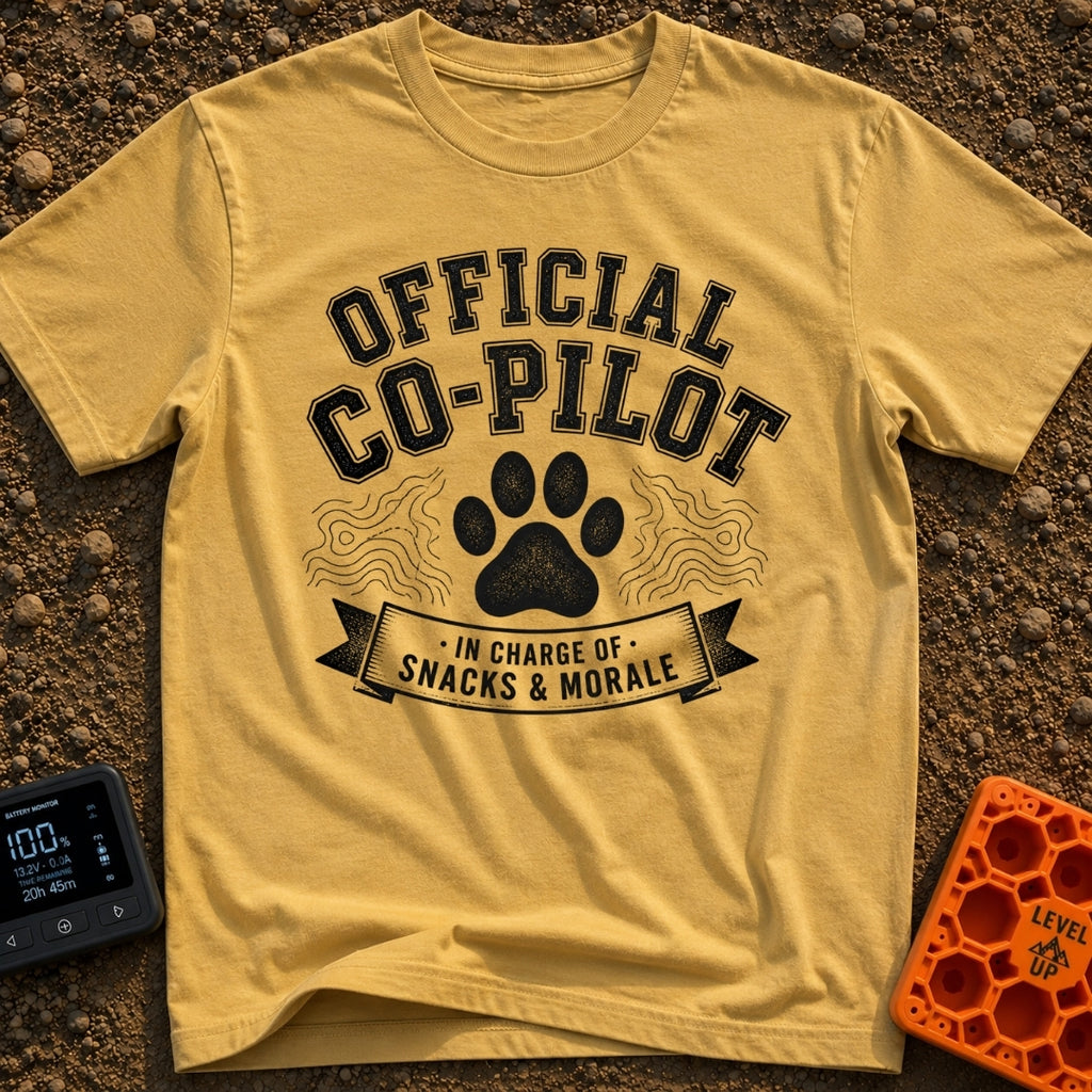Director of Snacks - T-Shirt in Mustard - A black and white graphic featuring a large animal paw print centered between...