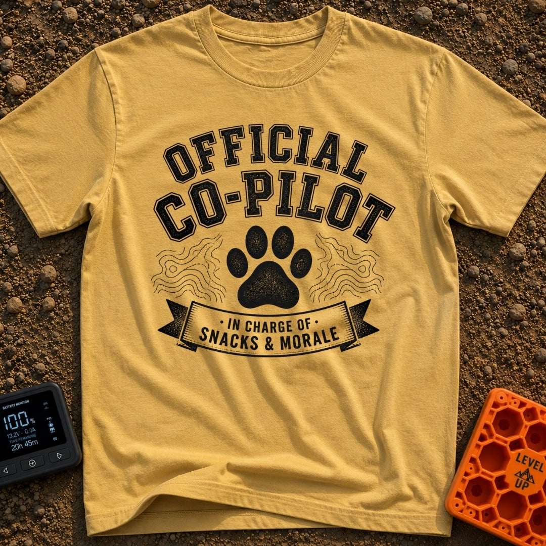 Director of Snacks - T-Shirt in Mustard - A black and white graphic featuring a large animal paw print centered between...
