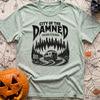 City Of The Jammed - T-Shirt in Bay - A black-and-white illustration of a rugged camper van driving on a dirt road into a...