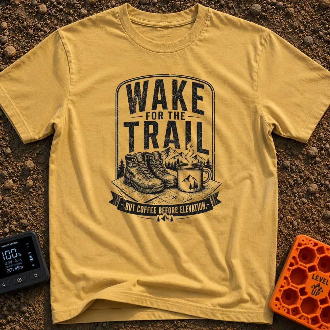 Coffee Before Climb - T-Shirt in Mustard - A black-and-white illustration of a pair of hiking boots and a steaming enamel...