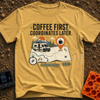 Coffee Then Coordinates - T-Shirt in Mustard - An illustration of a white camper van situated on a large topographical...