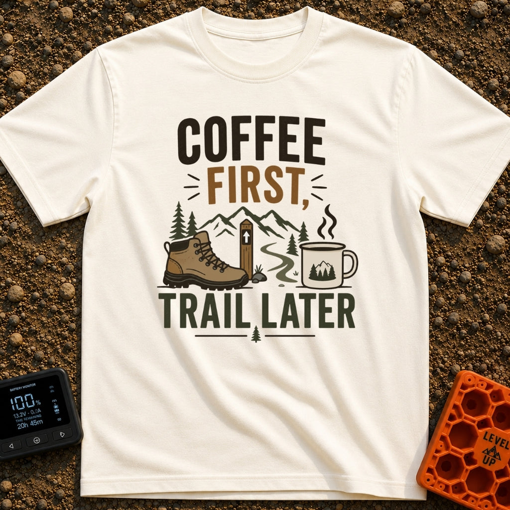 Brews Before Views - T-Shirt in Ivory - A graphic featuring the text "COFFEE FIRST, TRAIL LATER" alongside an...