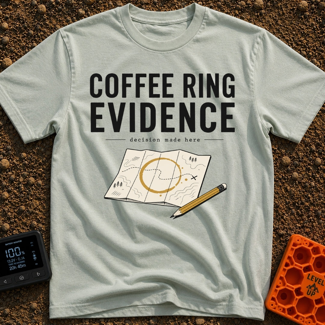 Brewed Trail Mystery - T-Shirt in Bay - The artwork shows the text "COFFEE RING EVIDENCE" and "decision made here" above...