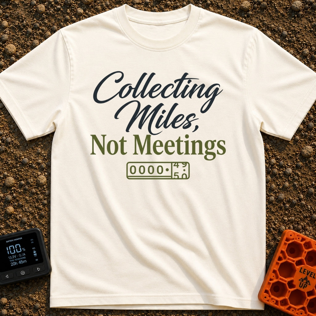 Miles Over Meetings - T-Shirt in Ivory - Text reading "Collecting Miles, Not Meetings" displayed above a simple line...
