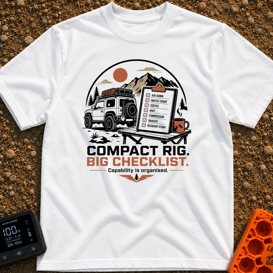 Tiny Rig Big Checklist - T-Shirt in White - A small 4x4 vehicle with a roof rack and off-road gear parked in front of...