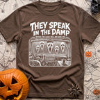 Dampening My Spirits - T-Shirt in Espresso - A distressed white line-drawing showing the interior dashboard of a van with...