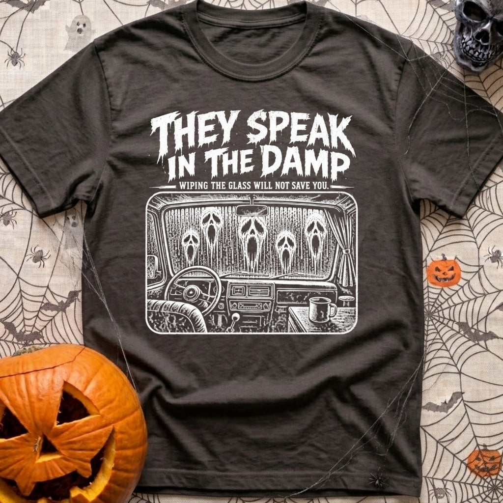 Dampening My Spirits - T-Shirt in Graphite - A distressed white line-drawing showing the interior dashboard of a van with...
