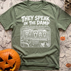 Dampening My Spirits - T-Shirt in Moss - A distressed white line-drawing showing the interior dashboard of a van with a...