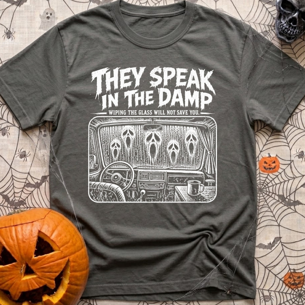 Dampening My Spirits - T-Shirt in Pepper - A distressed white line-drawing showing the interior dashboard of a van with a...