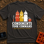 Condiments Take The Wheel - T-Shirt in Graphite - Three cartoon condiment bottles—ketchup, mustard, and...