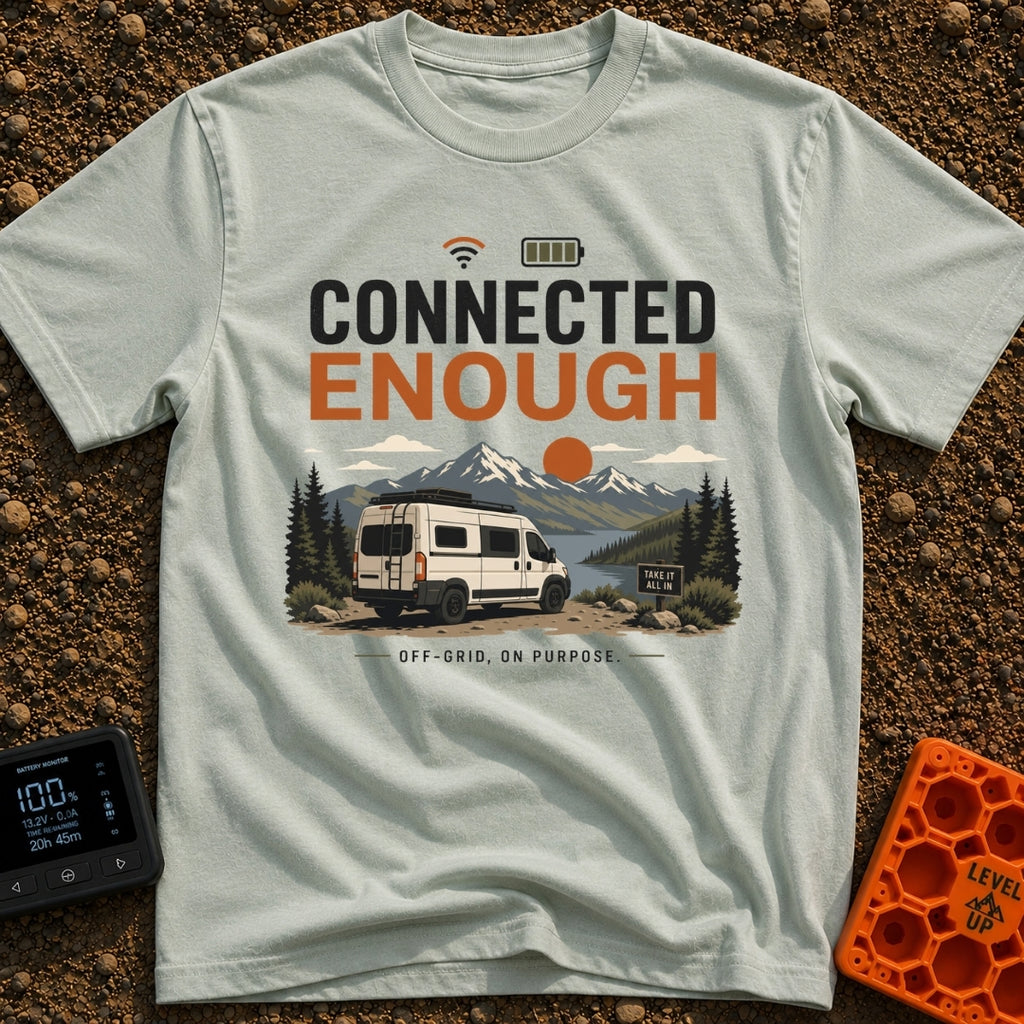 Just Connected Enough - T-Shirt in Bay - A white camper van parked on a dirt path overlooking a lake, pine trees, and...