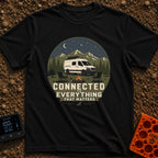 Connected To What Matters - T-Shirt in Black - A white camper van parked at night in a mountainous forest setting,...