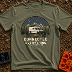 Connected To What Matters - T-Shirt in Moss - A white camper van parked at night in a mountainous forest setting,...