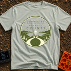 Connected Where It Matters - T-Shirt in Bay - A circular badge design in olive green and cream featuring the text...