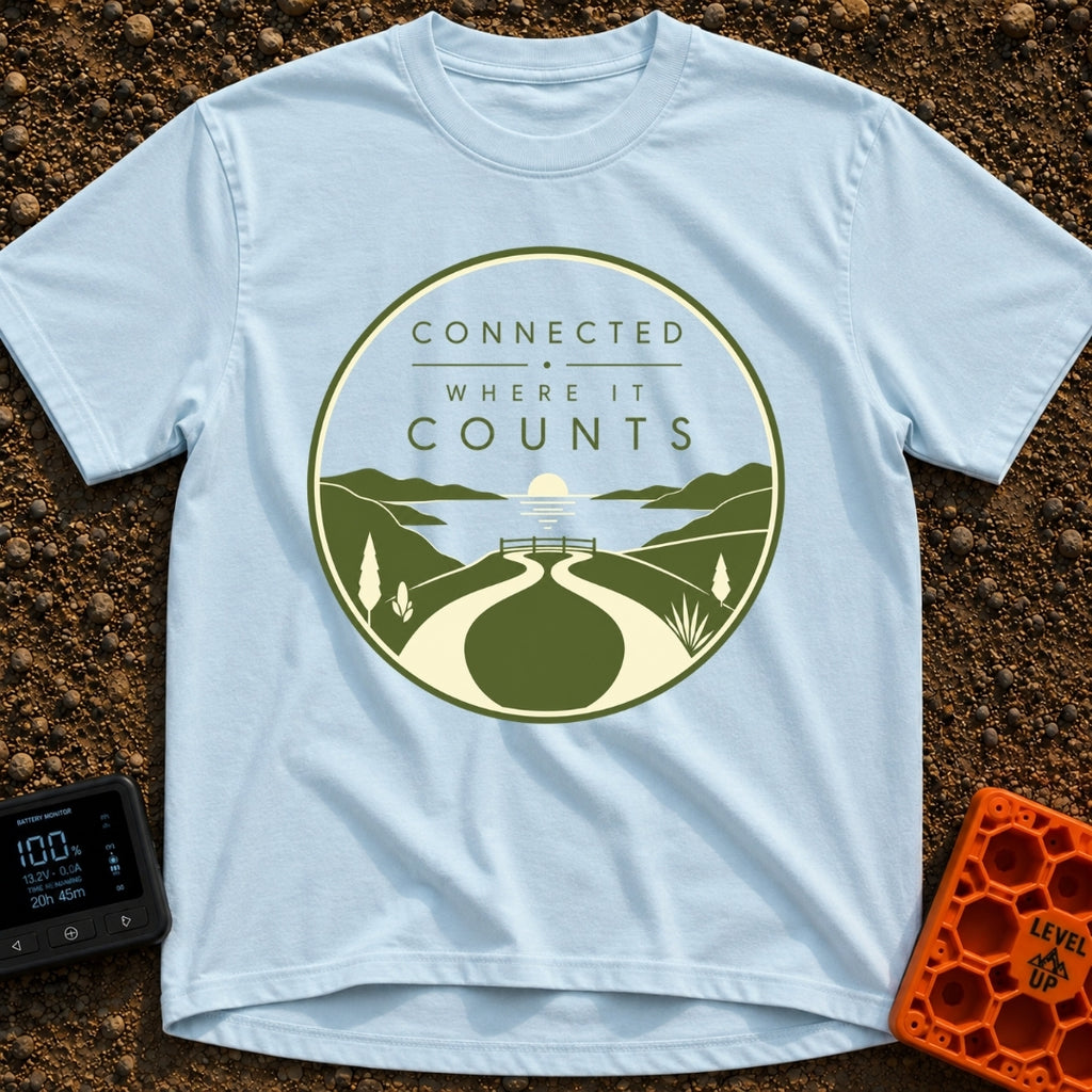 Connected Where It Matters - T-Shirt in Chambray - A circular badge design in olive green and cream featuring the text...