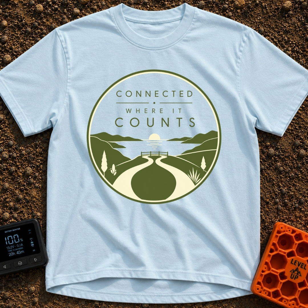 Connected Where It Matters - T-Shirt in Chambray - A circular badge design in olive green and cream featuring the text...