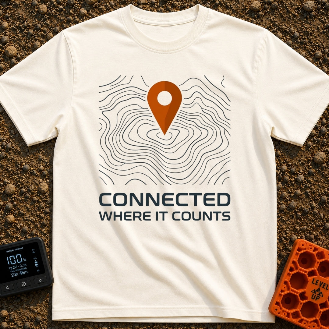 Where It Counts - T-Shirt in Ivory - A graphic featuring a stylized orange map pin pointing downward onto a background of...