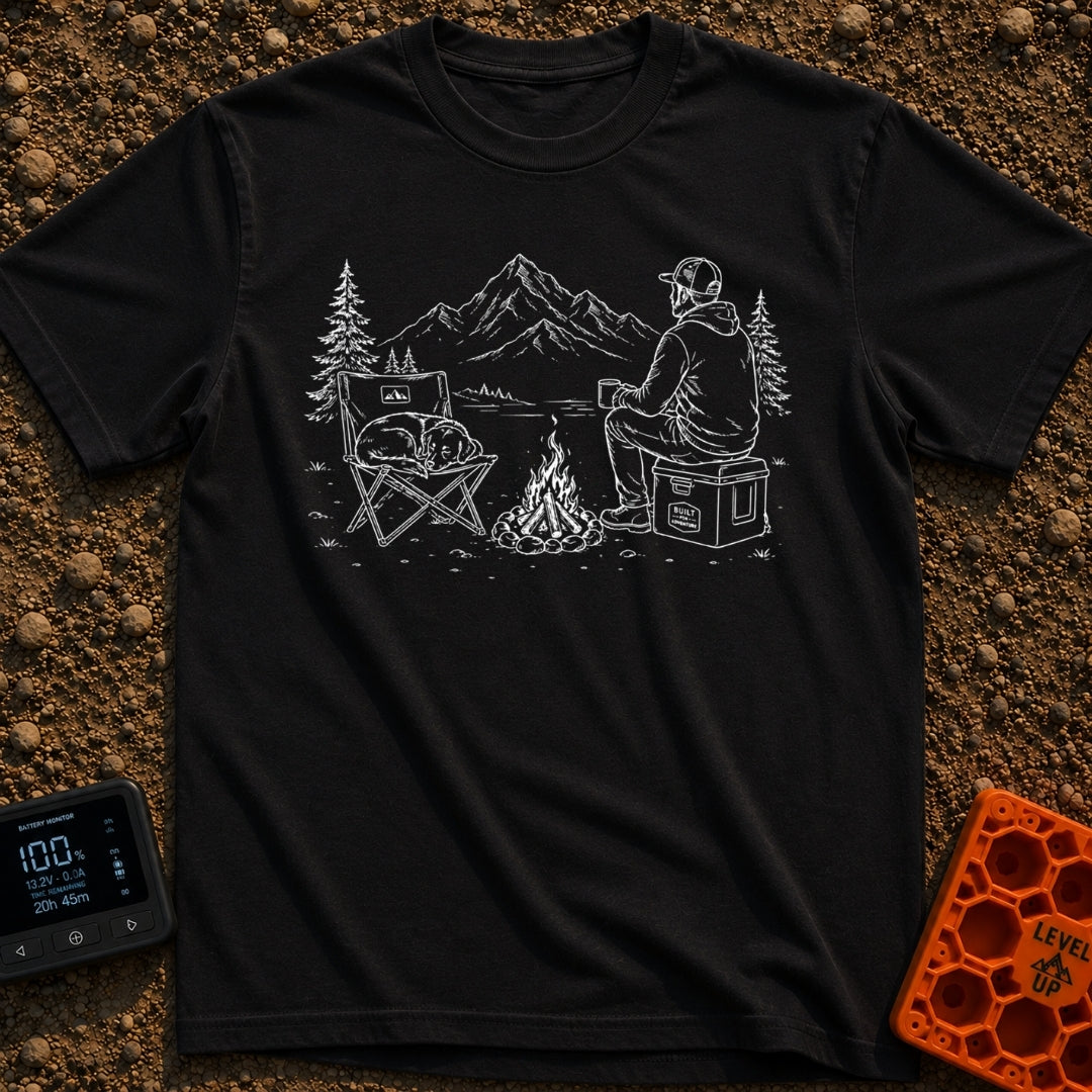 Cooler Recess Recharge - T-Shirt in Black - A line drawing of a person sitting on a cooler by a campfire, holding a mug...