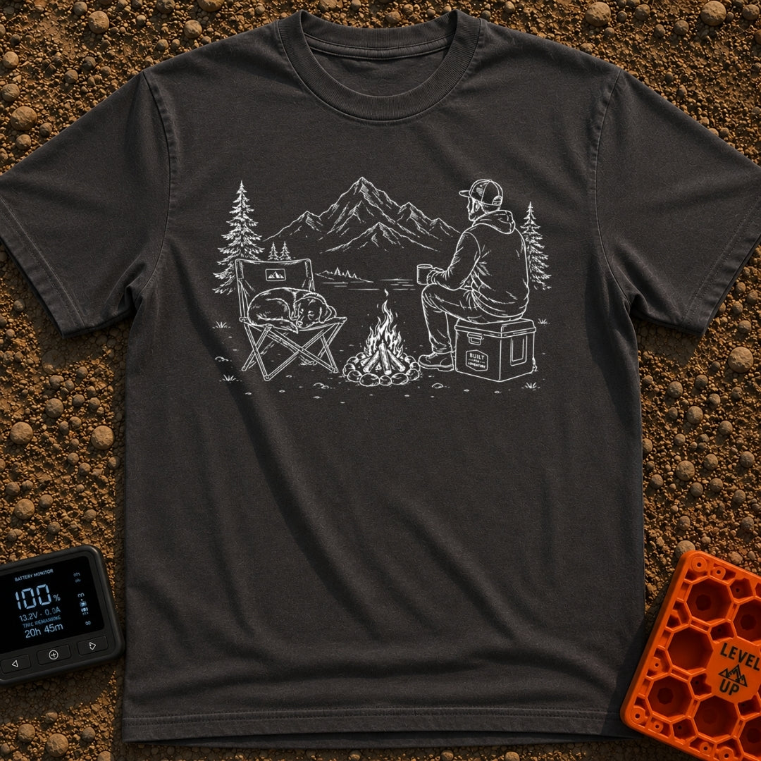 Cooler Recess Recharge - T-Shirt in Graphite - A line drawing of a person sitting on a cooler by a campfire, holding a...