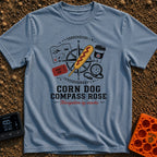 Snacks Guide Me - T-Shirt in Blue Jean - An illustration of a compass rose overlaid with a large corn dog, surrounded by...