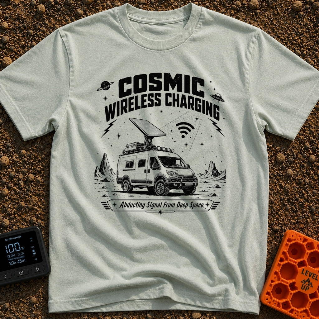Charged By The Cosmos - T-Shirt in Bay - A black and white illustration of a rugged camper van parked on a rocky,...
