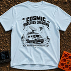 Charged By The Cosmos - T-Shirt in Chambray - A black and white illustration of a rugged camper van parked on a rocky,...