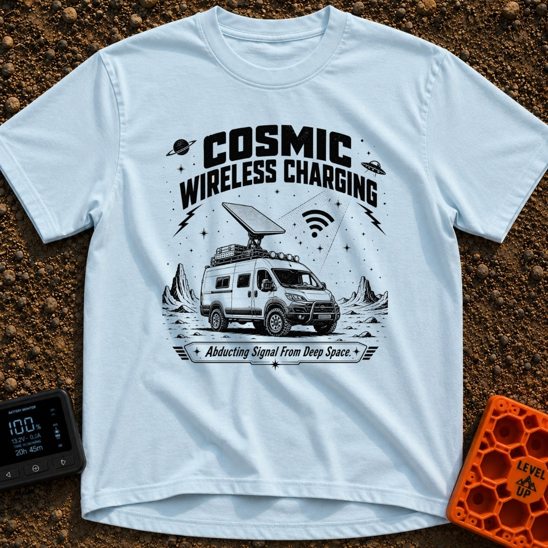 Charged By The Cosmos - T-Shirt in Chambray - A black and white illustration of a rugged camper van parked on a rocky,...