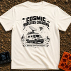 Charged By The Cosmos - T-Shirt in Ivory - A black and white illustration of a rugged camper van parked on a rocky,...