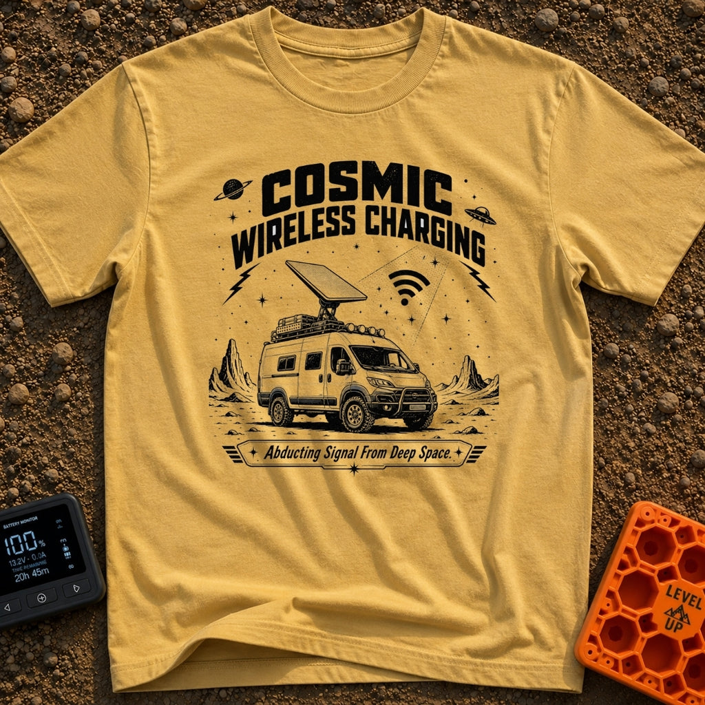 Charged By The Cosmos - T-Shirt in Mustard - A black and white illustration of a rugged camper van parked on a rocky,...