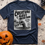 The Grey Water Creature - T-Shirt in Navy - A black-and-white illustration of a scaly, dripping monster hand reaching out...