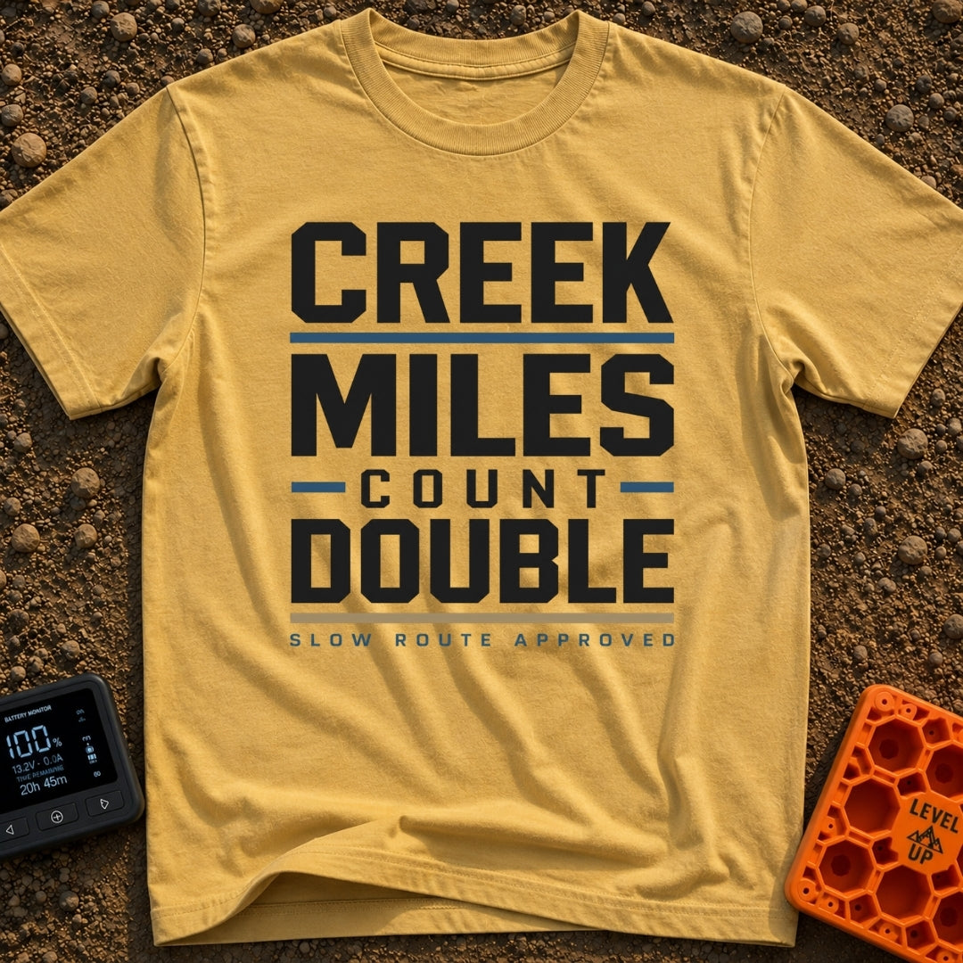 Creek Miles Count Double - T-Shirt in Mustard - A text-based design featuring the words 'CREEK MILES' and 'DOUBLE' in...