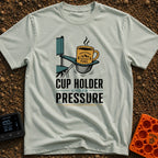 Cup Under Pressure - T-Shirt in Bay - An illustration of a folding camp chair armrest with its mesh cup holder bulging...