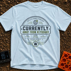 Ctrl Alt Escape - T-Shirt in Chambray - A circular, stamp-like badge design featuring the main text "CURRENTLY AWAY FROM...