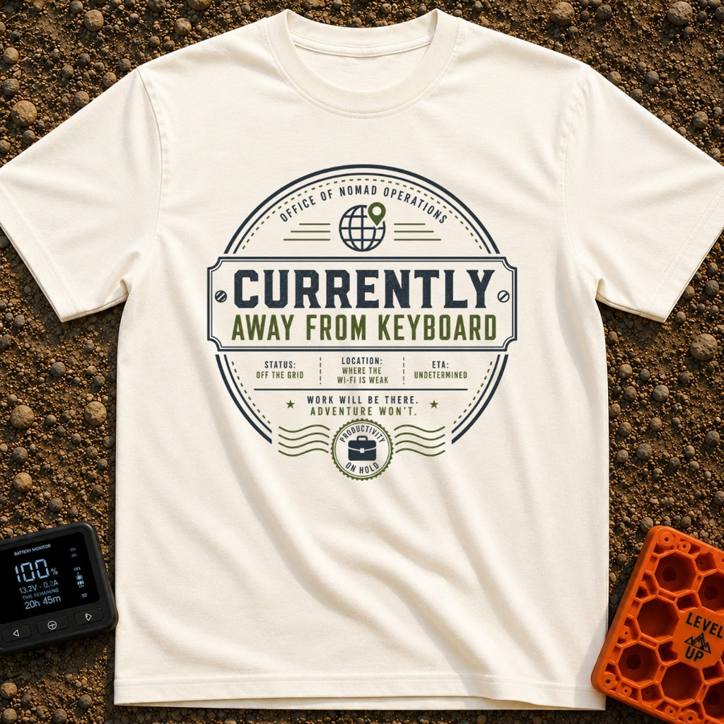 Ctrl Alt Escape - T-Shirt in Ivory - A circular, stamp-like badge design featuring the main text "CURRENTLY AWAY FROM...