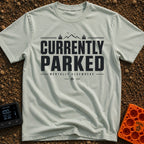 Parked Until Further Notice - T-Shirt in Bay - A text-based design featuring the large, bold words "CURRENTLY PARKED"...