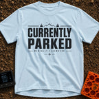 Parked Until Further Notice - T-Shirt in Chambray - A text-based design featuring the large, bold words "CURRENTLY...