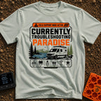 Paradise Debugger Active - T-Shirt in Bay - A white camper van is parked beside a lake with mountains and pine trees in...